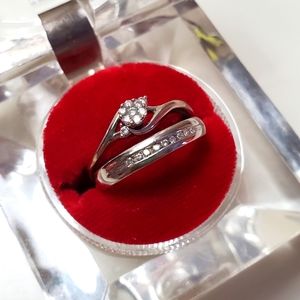 10kt white gold engagement ring and diamonds.